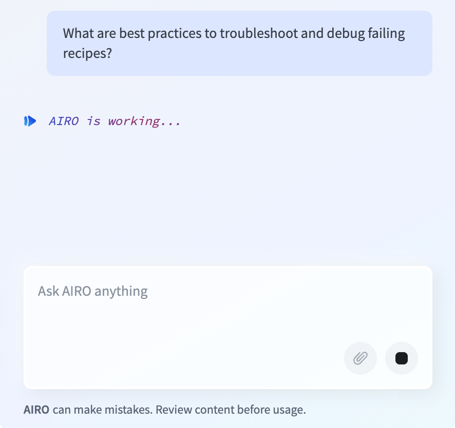 停止ボタンが送信ボタンの代わりに表示された"AIRO is working..."メッセージを示すAIROチャットパネル