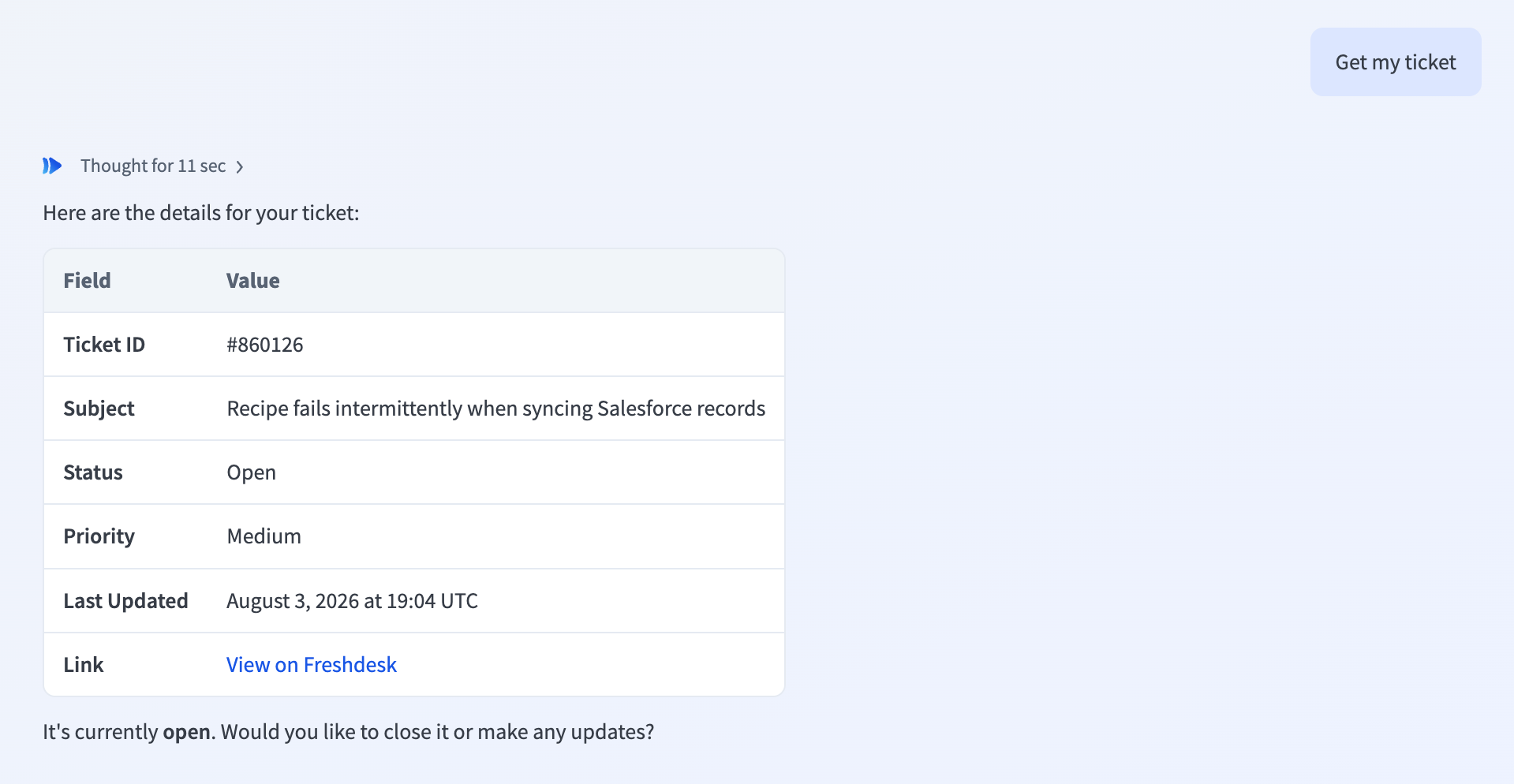 AIRO chat response showing a support ticket's status, priority, and a link to view it on Freshdesk.